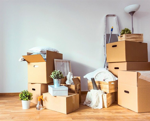 Moving boxes piled up